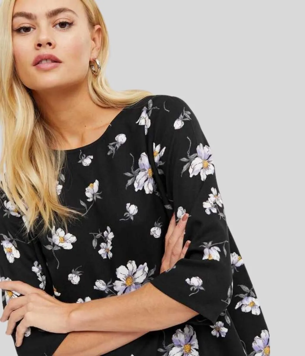 Double Faced Jersey Knit Black Floral Dipped Hem Top