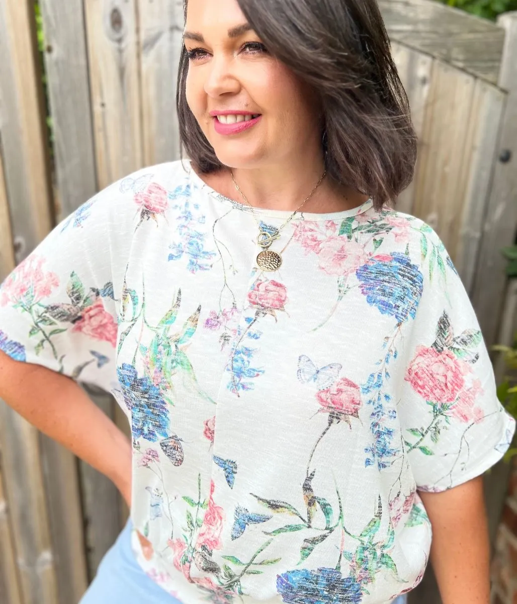 Ivory Floral Banded Hem Top Zero Waste Production Label